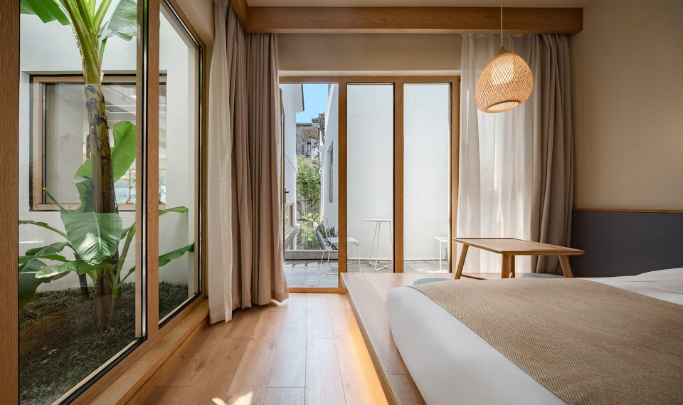 郑州旧房改民宿装修-花里精品民宿爱游戏最新官网_爱游戏(中国)装修实景图